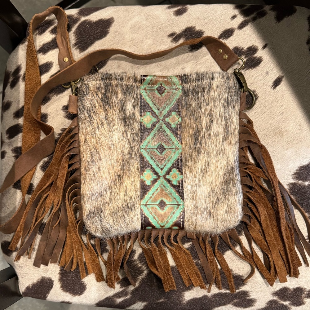 Cowhide crossbody purse with fringe